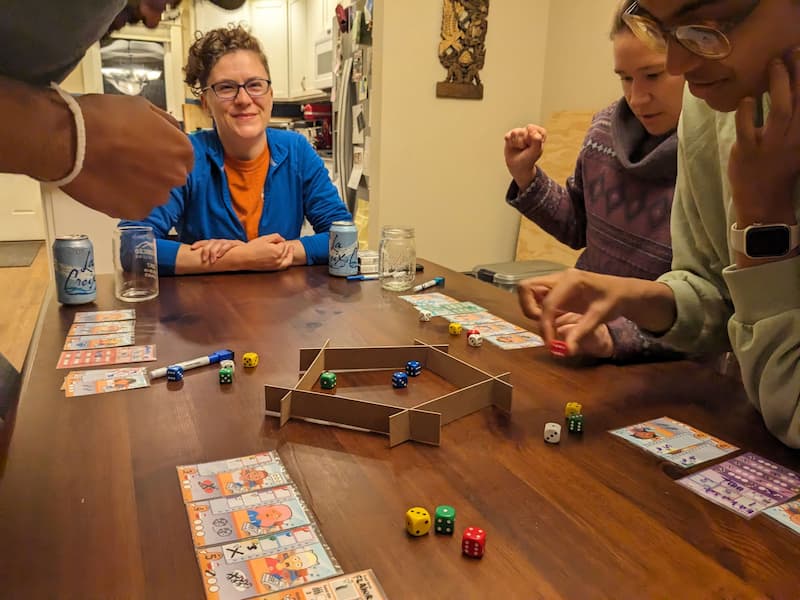 People playing an early prototype game of Chicken Fried Dice